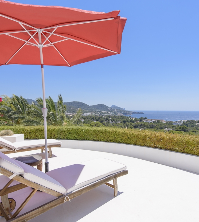 Resa Estates modern villa for sale te koop Cala Tarida Ibiza day beds and views.jpg